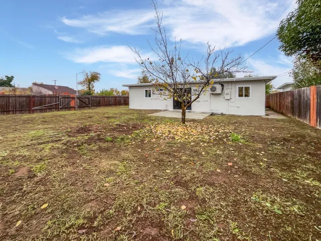 a picture of a bathroom with a shower