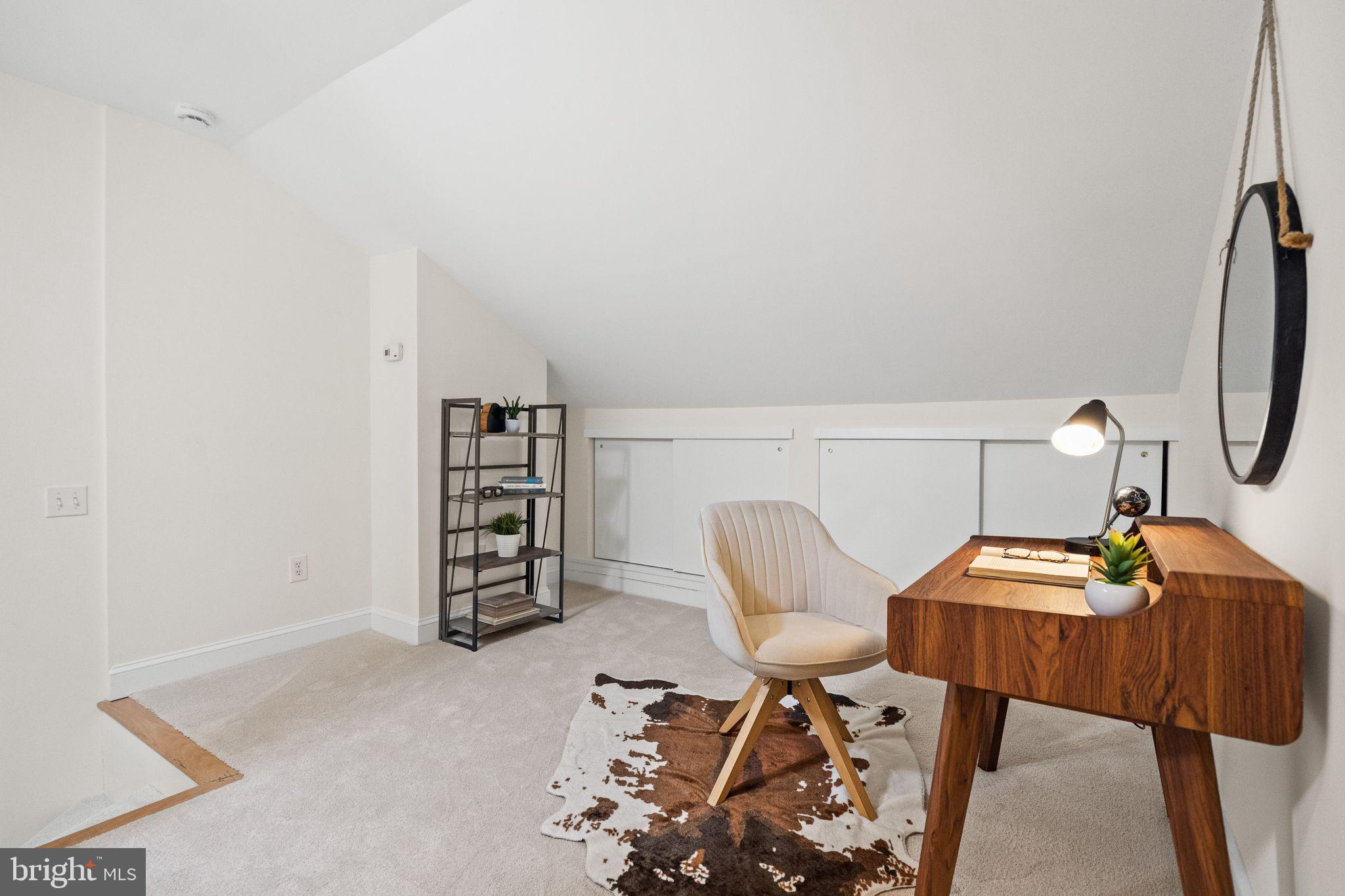 1008 Paper Mill Court, Unit 1008 Washington, DC 20007 - Photo 18 of 31 a view of a workspace with furniture