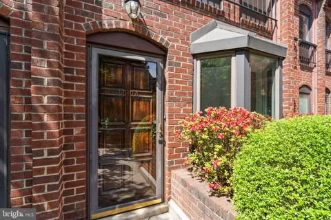 a front view of a house with a glass door