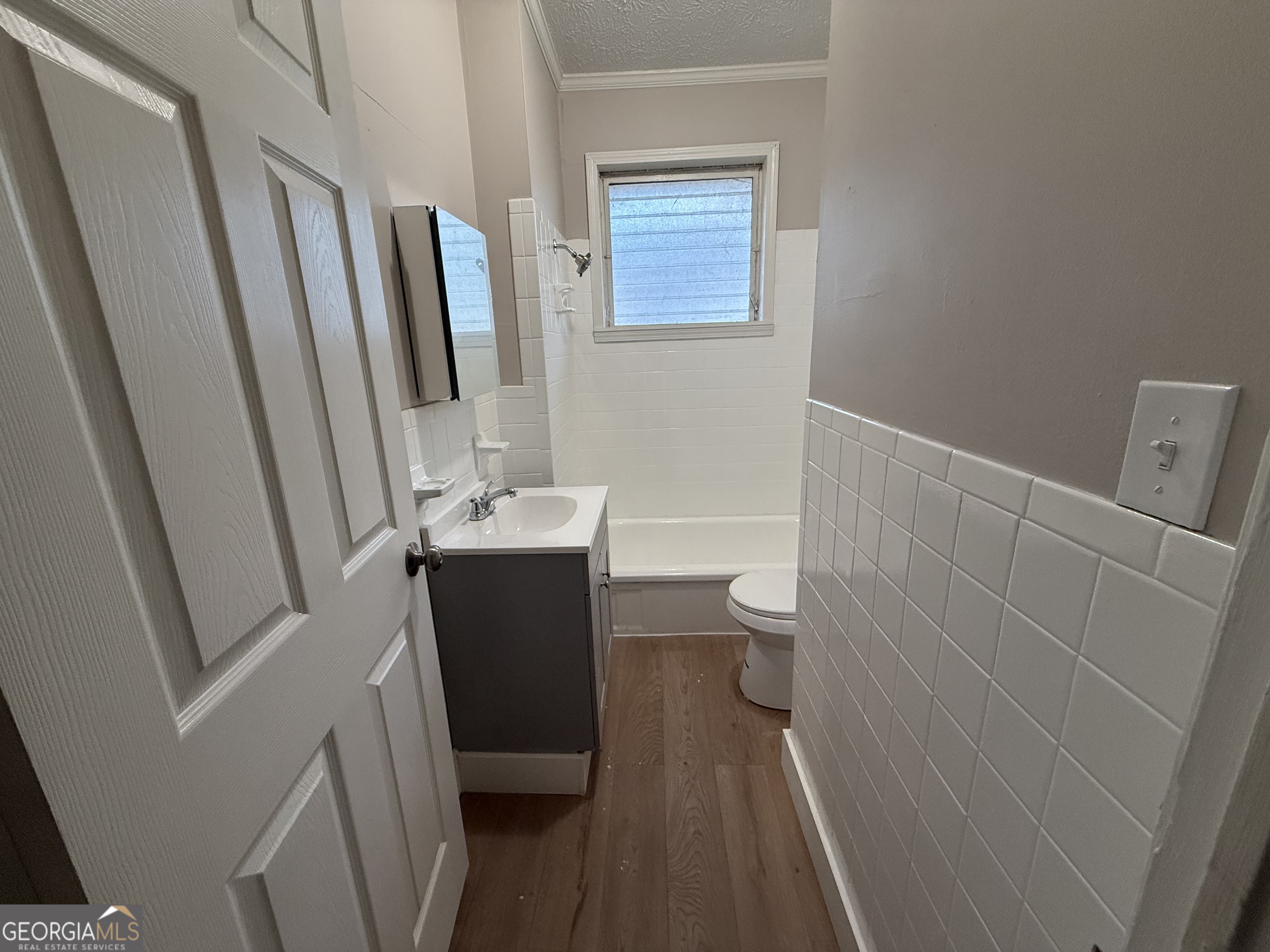 75 3rd Shannon Street Northeast Rome, GA 30161 - Photo 11 of 14 a bathroom with sink a toilet a tub and shower