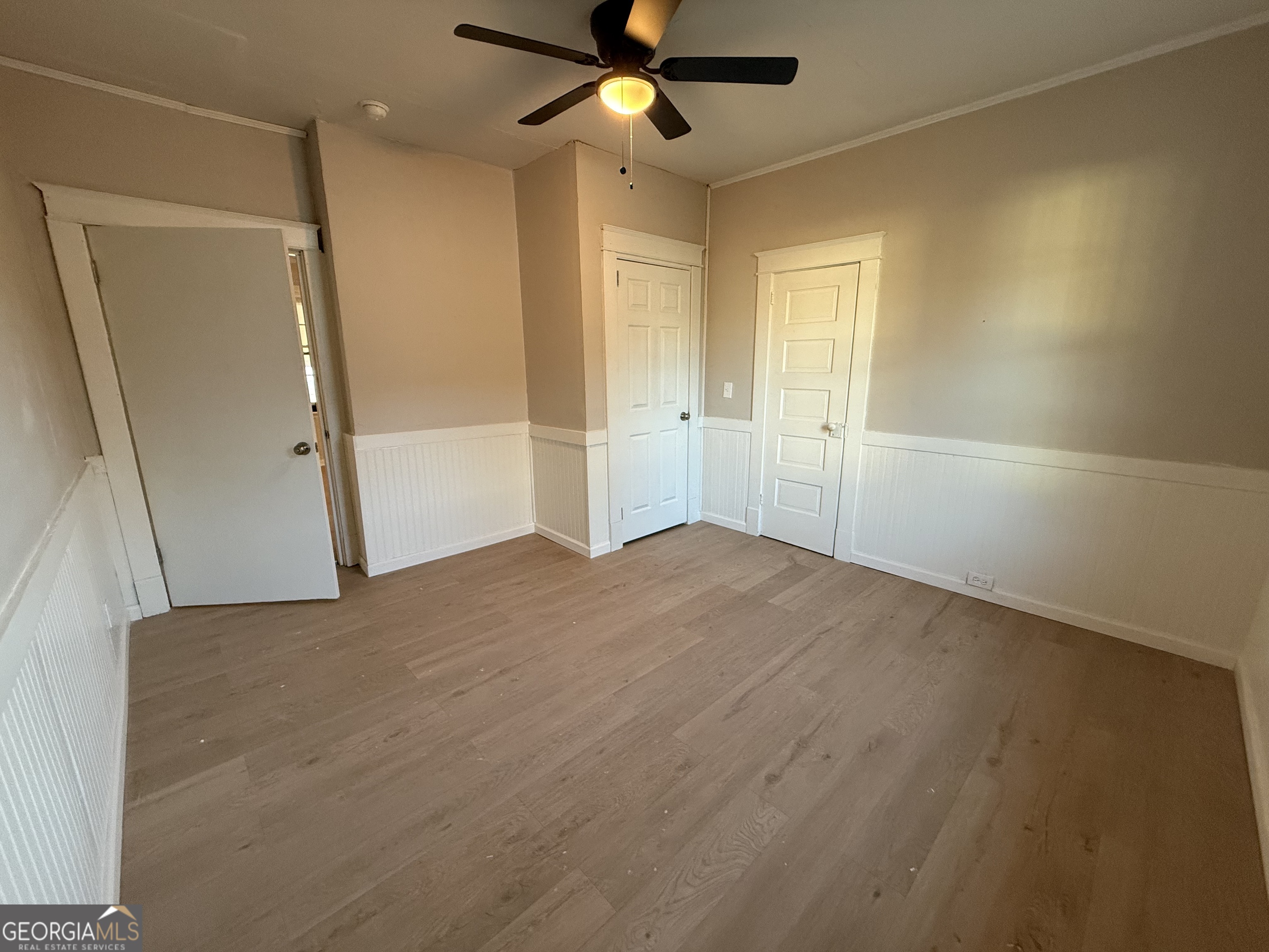 75 3rd Shannon Street Northeast Rome, GA 30161 - Photo 14 of 14 wooden floor in an empty room with a cabinet