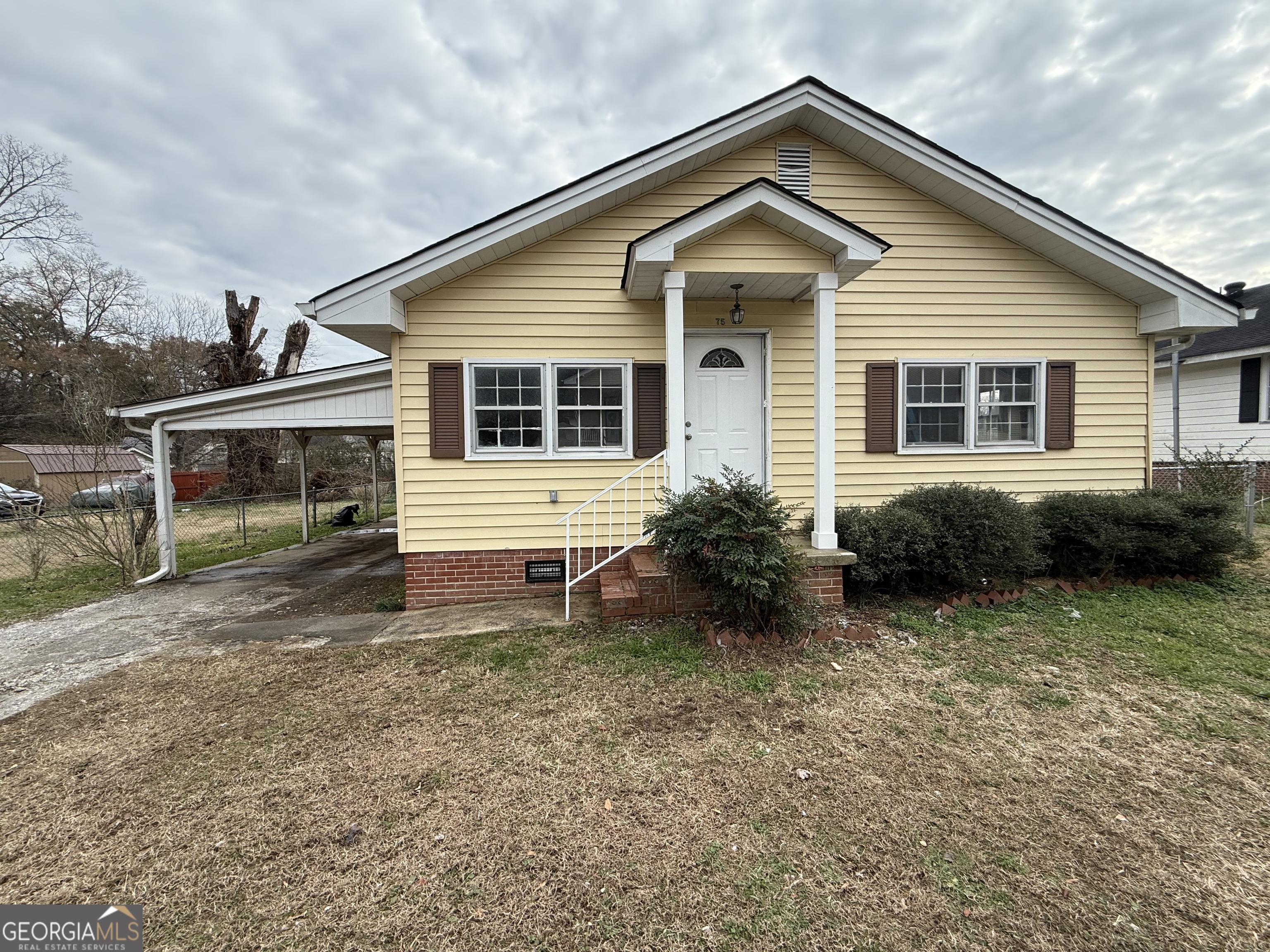 75 3rd Shannon Street Northeast Rome, GA 30161 - Photo 2 of 14 a view of a house with a yard and a large tree