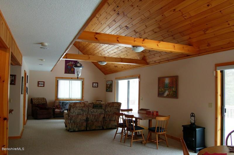 216 Dimmock Road Otis, MA 01253 - Photo 5 of 18 a living room with furniture and a window