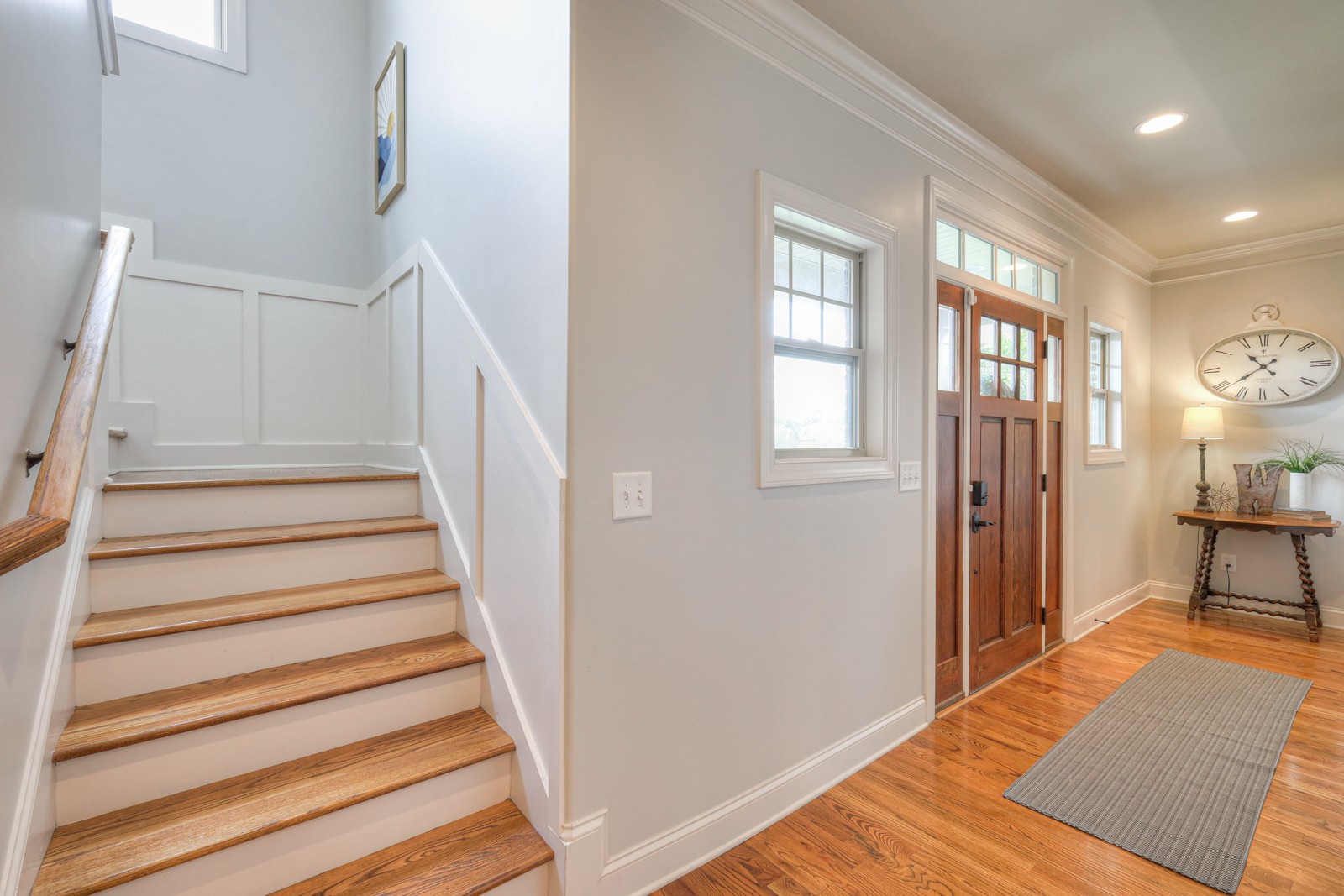 7020 Brindle Ridge Way Spring Hill, TN 37174 - Photo 21 of 42 a view of a livingroom with wooden floor and stairs