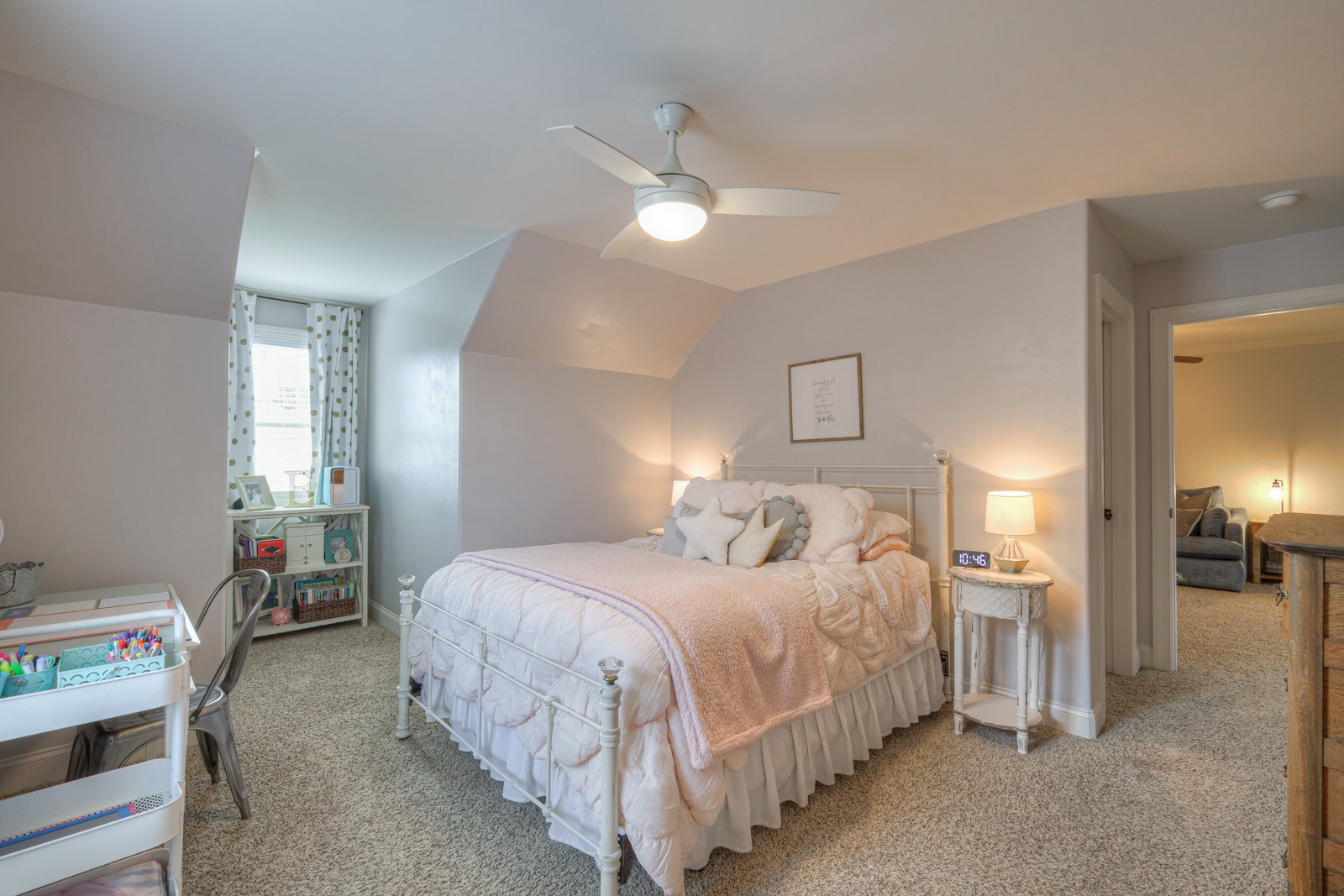 7020 Brindle Ridge Way Spring Hill, TN 37174 - Photo 27 of 42 a bedroom with a bed and a chandelier