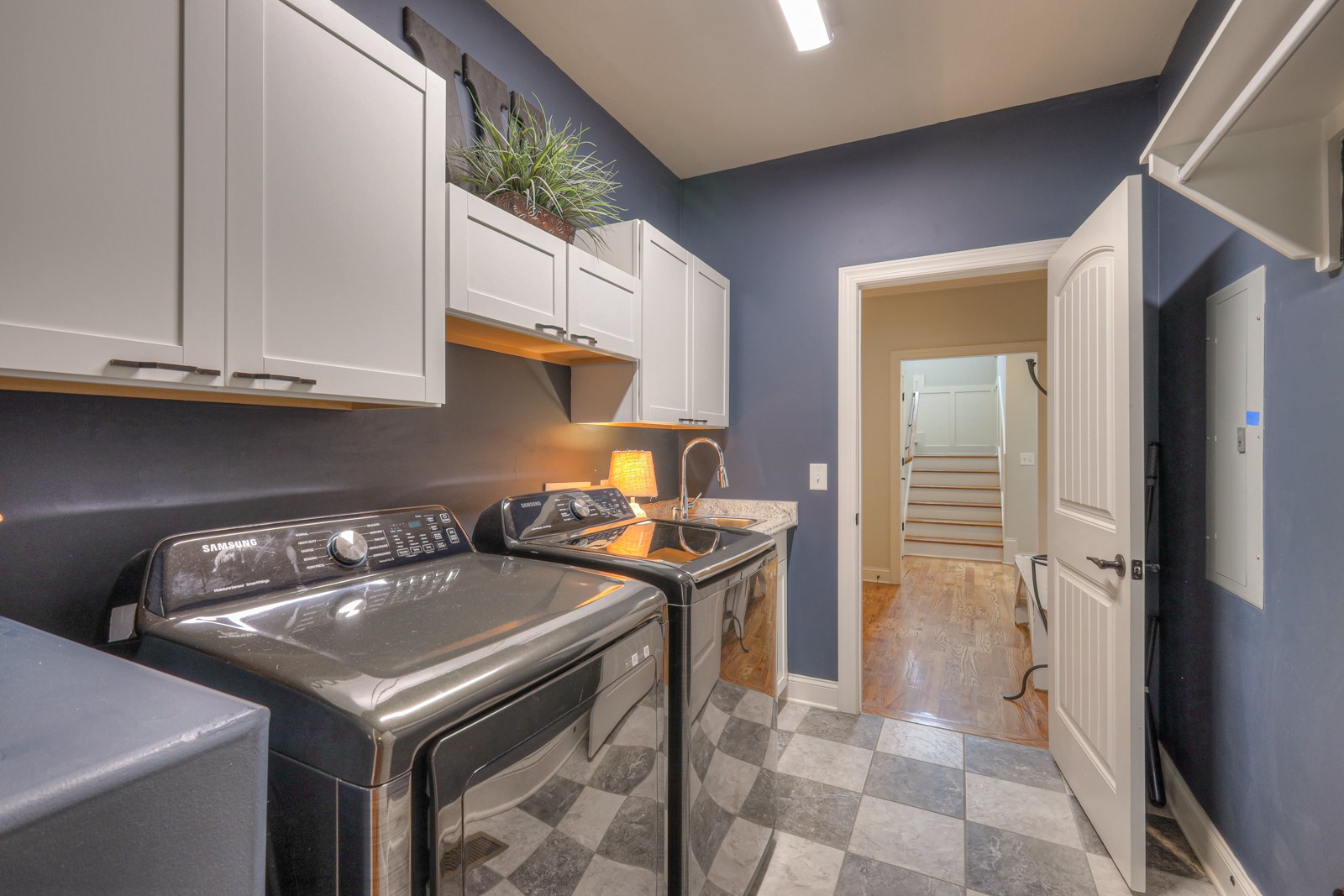 7020 Brindle Ridge Way Spring Hill, TN 37174 - Photo 38 of 42 a kitchen with a sink a stove and a refrigerator