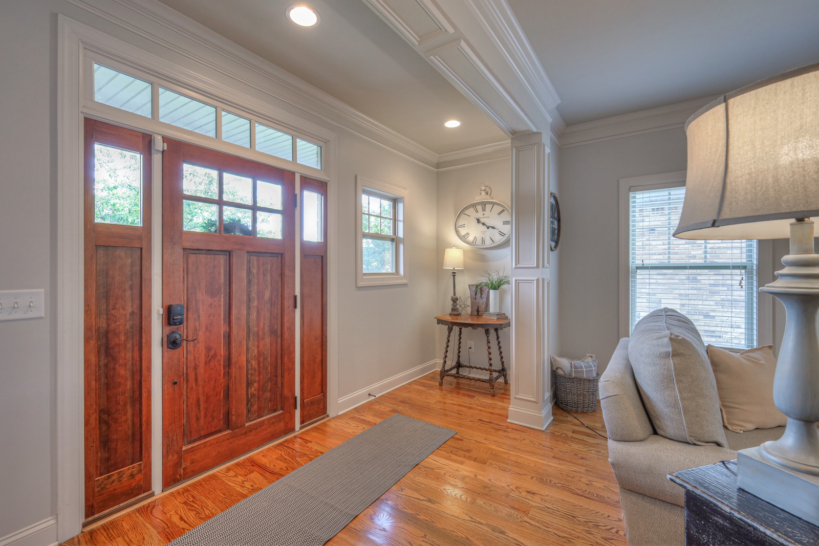 7020 Brindle Ridge Way Spring Hill, TN 37174 - Photo 6 of 42 a living room with furniture a fireplace and a large window