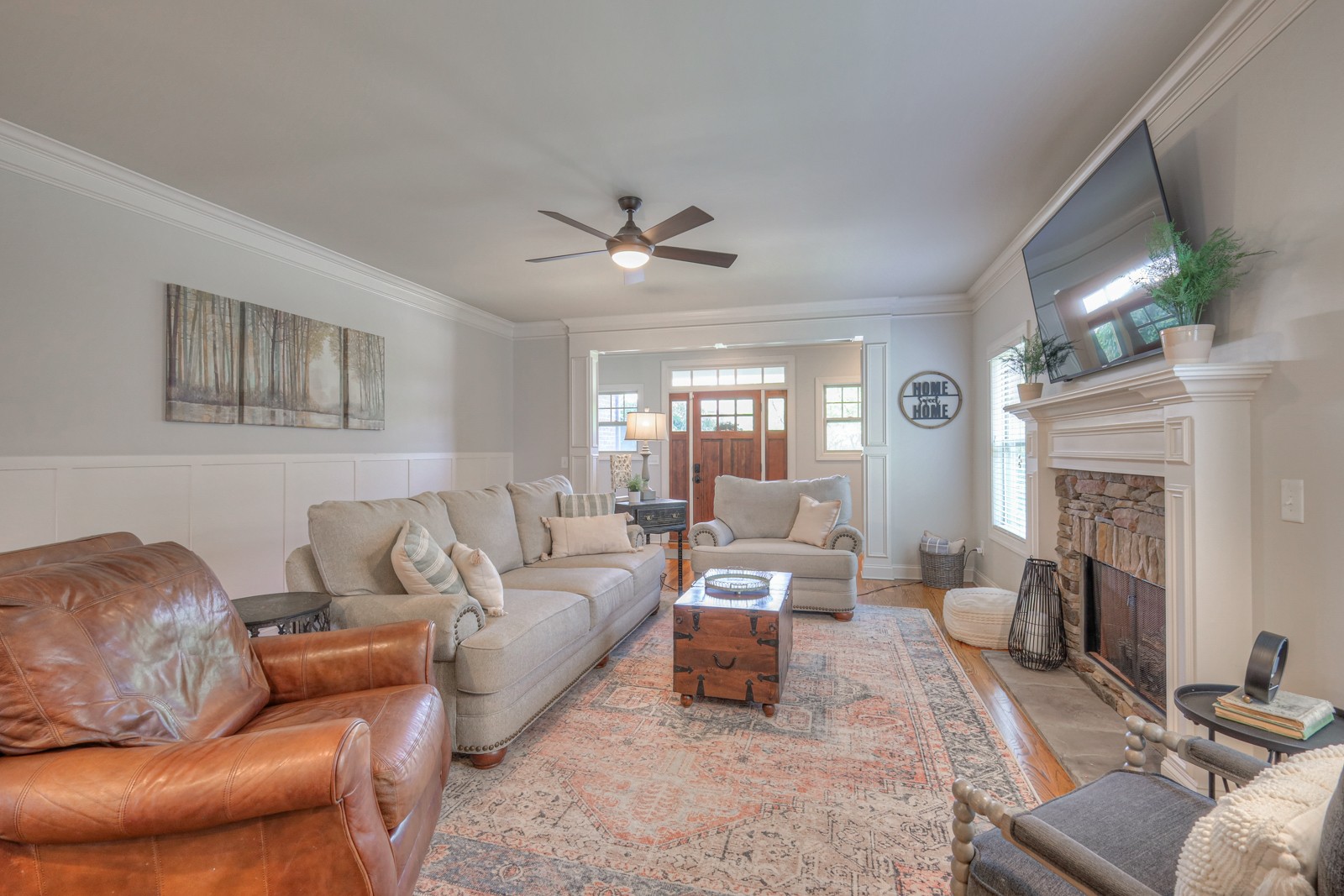 7020 Brindle Ridge Way Spring Hill, TN 37174 - Photo 8 of 42 a living room with furniture and a fireplace