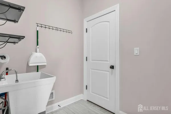 a view of small space with racks on the wall