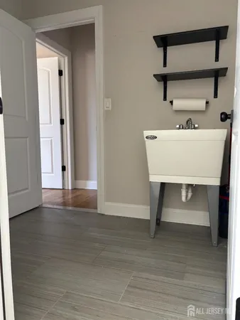 a view of small space with racks on the wall