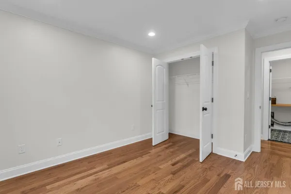 an aerial view of a house with outdoor space