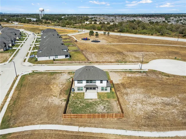a view of a swimming pool with an ocean view