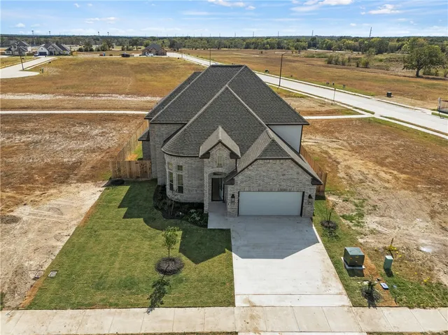 a view of a swimming pool and an outdoor space