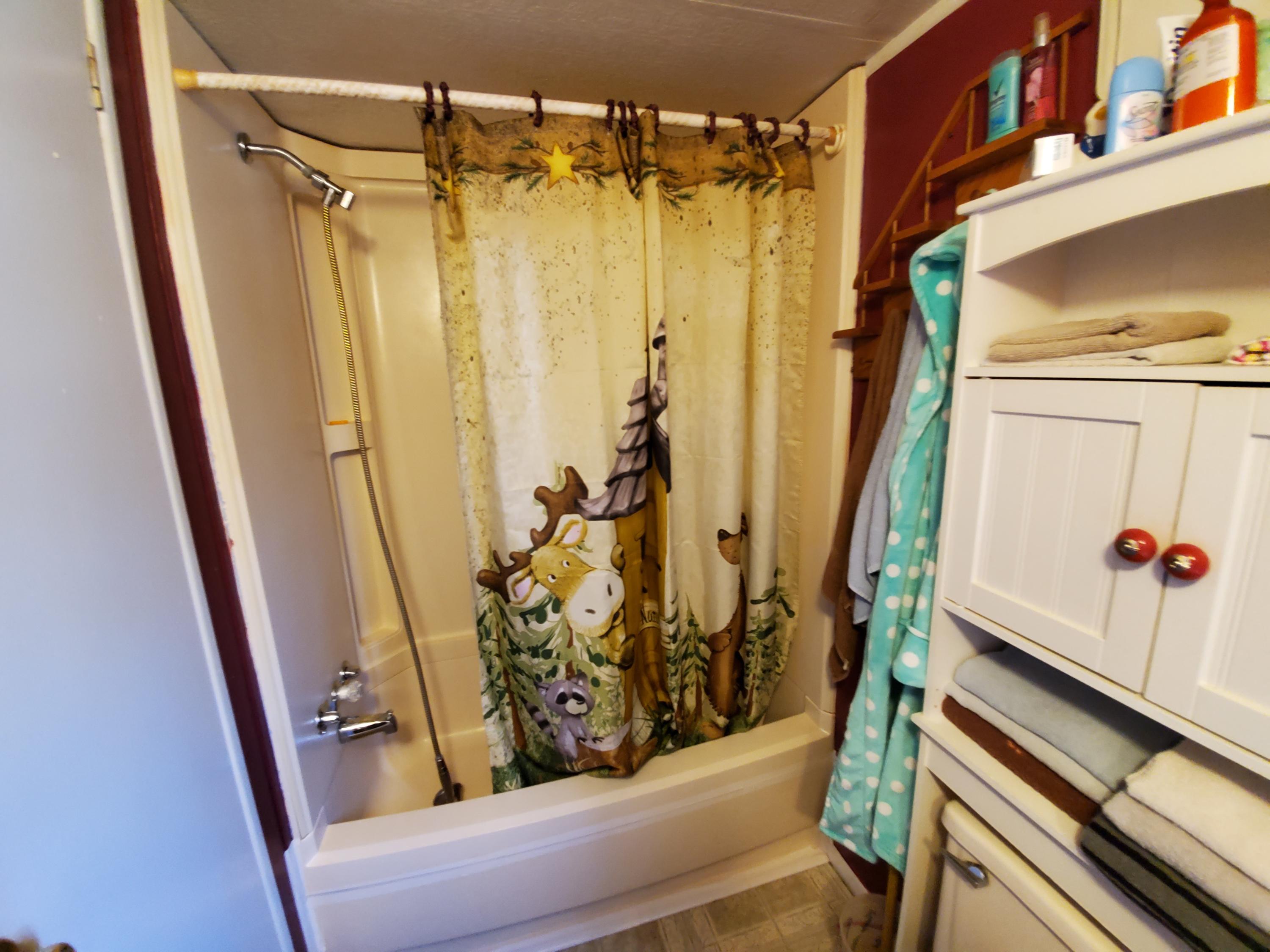 360 Half Township Road Lincoln, ME 04457 - Photo 11 of 36 Main full bath features tub
