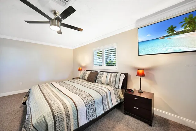 a bathroom with a granite countertop sink mirror and a window