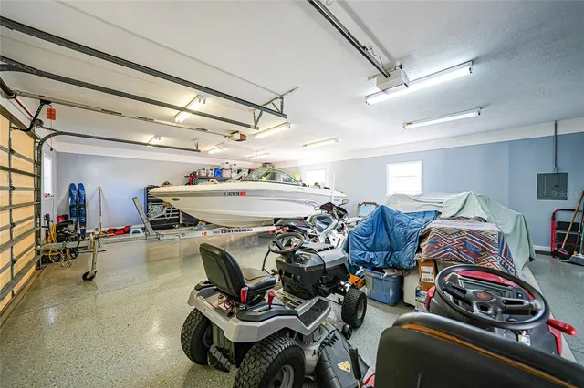 a view of a livingroom with furniture and a kitchen