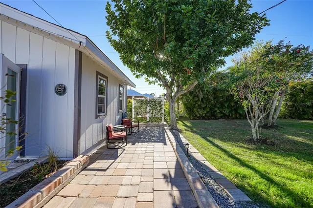 a house view with a garden space