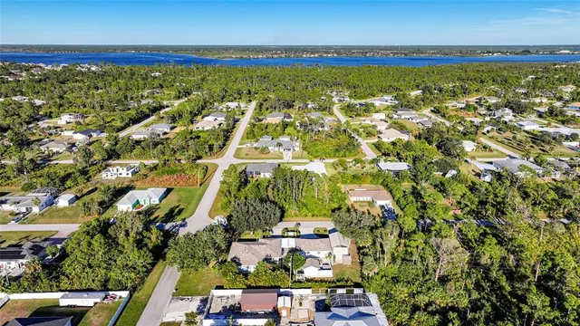 an aerial view of a house with a garden