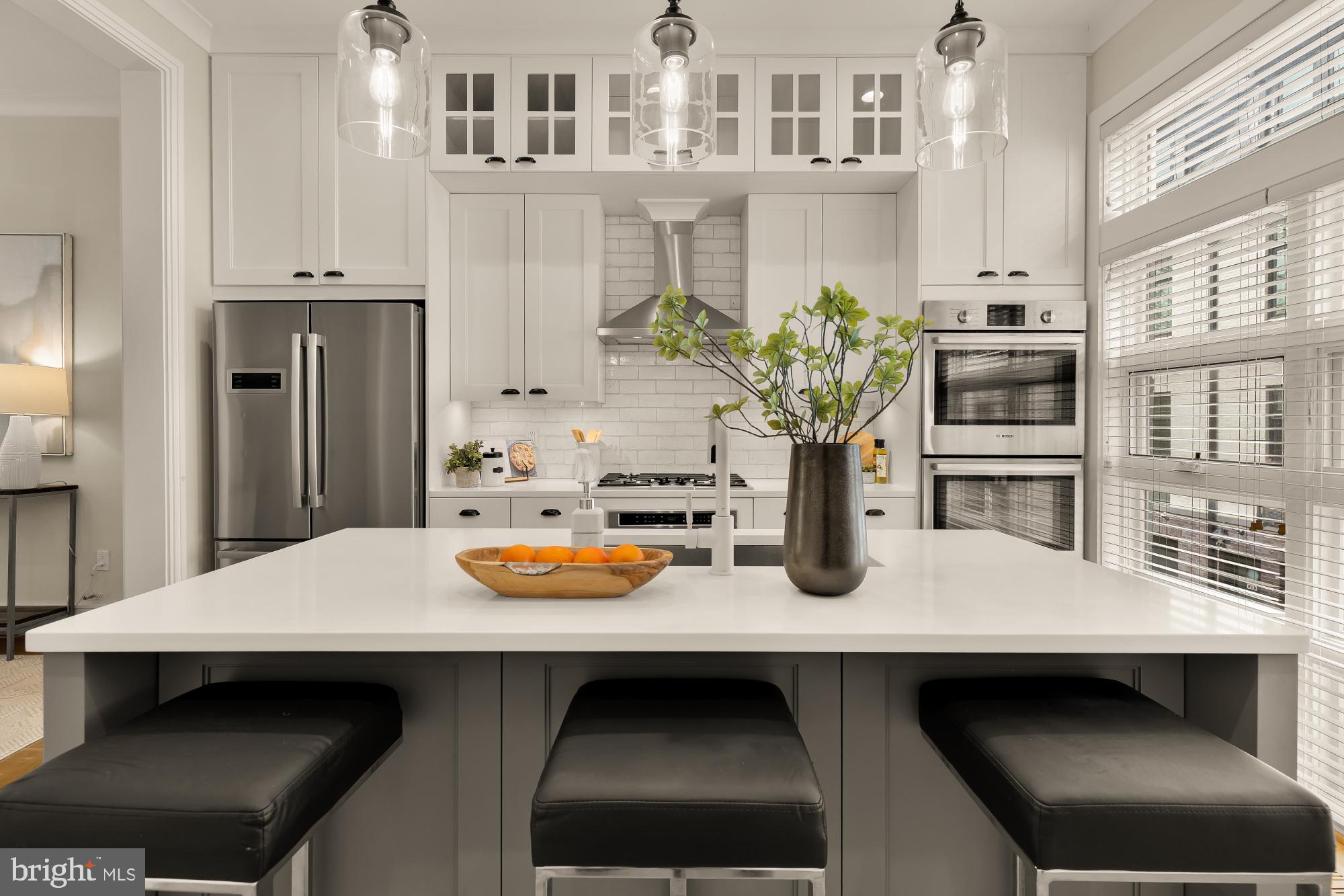 415 Guethler's Way Washington, DC 20003 - Photo 7 of 32 a kitchen with a sink and stove