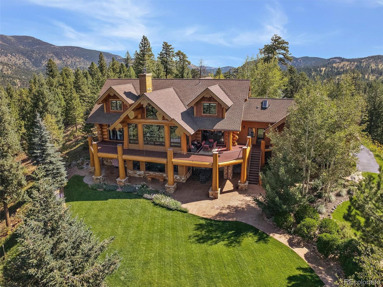 a aerial view of a house with a big yard