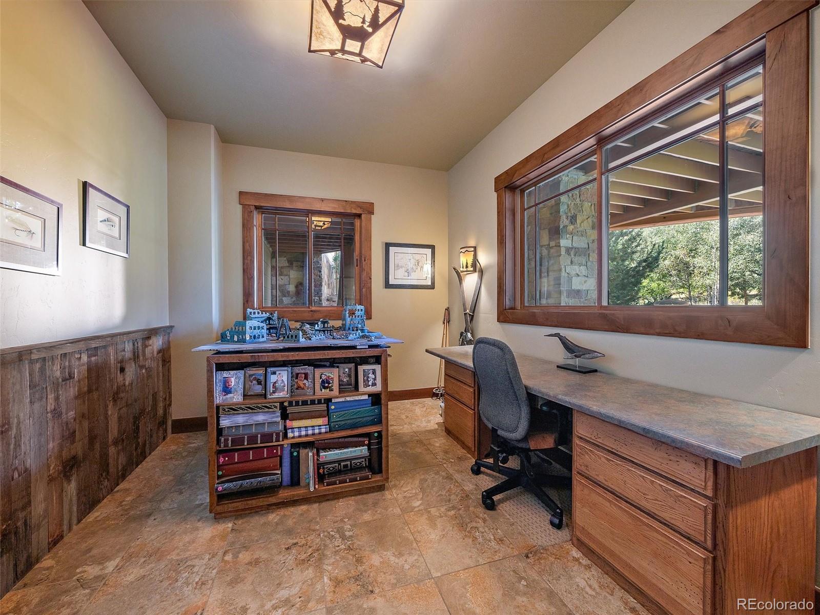 451 Bear Meadow Trail Evergreen, CO 80439 - Photo 26 of 45 a workspace with furniture and window