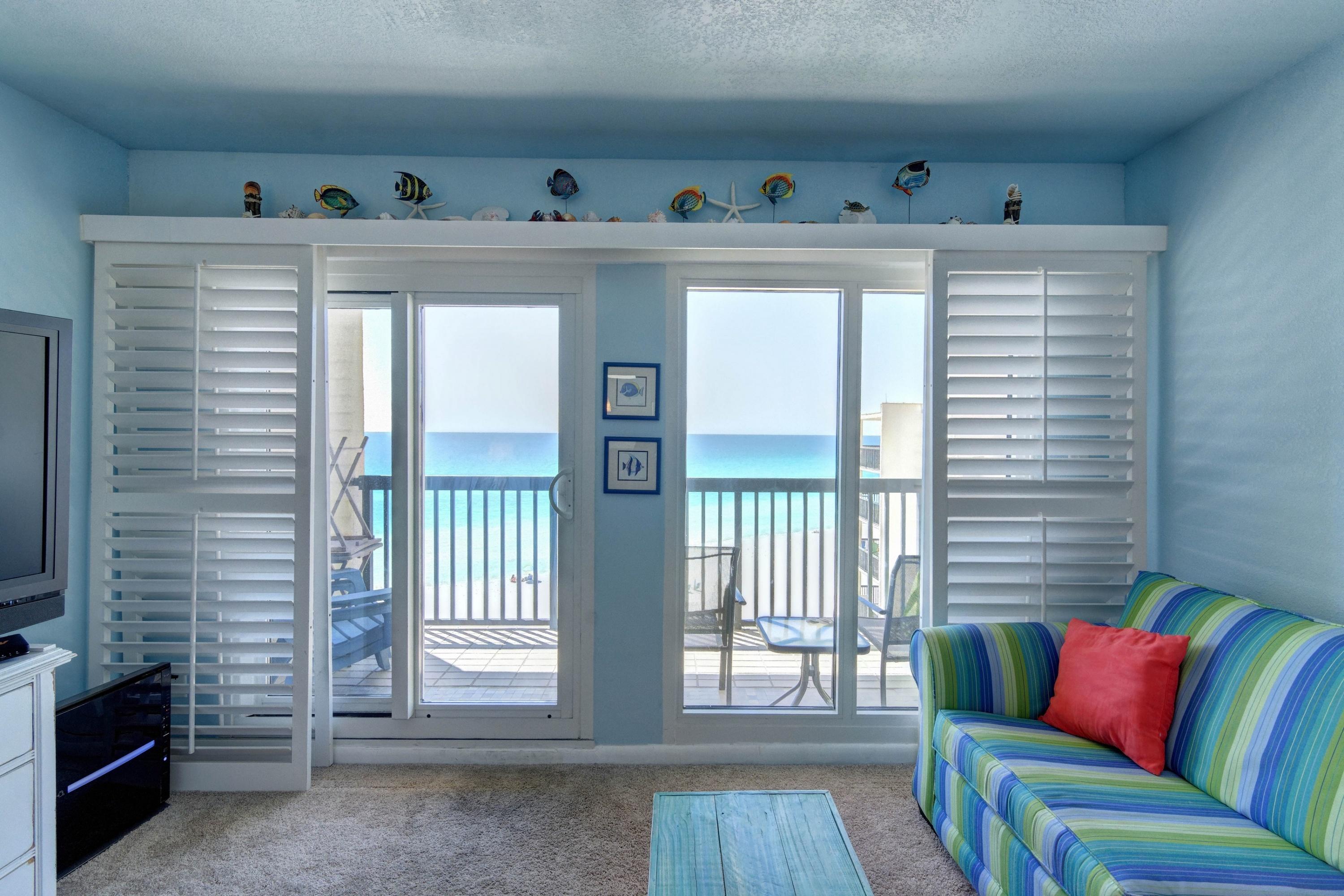 23223 Front Beach Road, Unit 701 Panama City Beach, FL 32413 - Photo 12 of 42 a living room with furniture and a window
