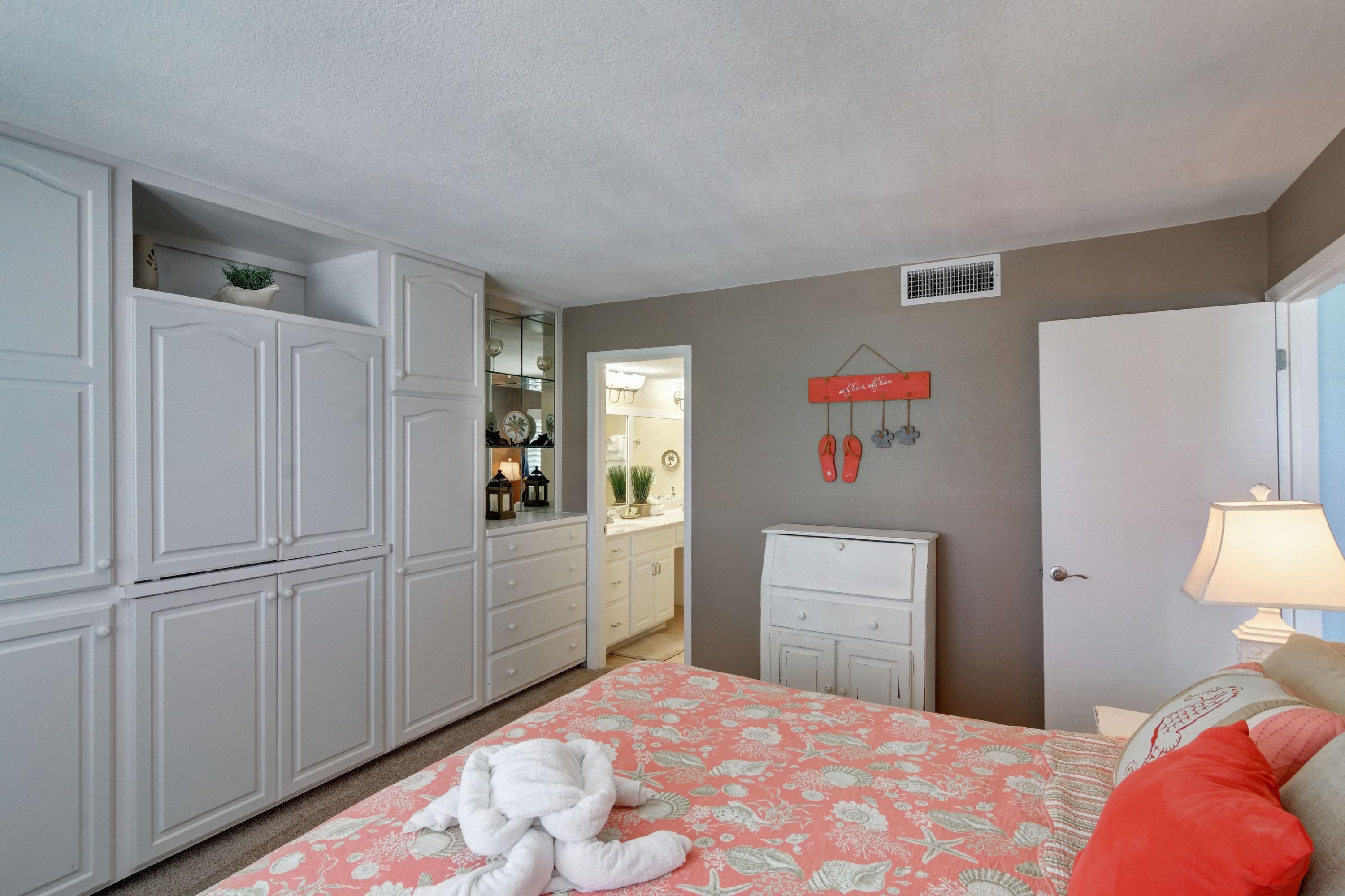23223 Front Beach Road, Unit 701 Panama City Beach, FL 32413 - Photo 20 of 42 a bedroom with a bed and a window
