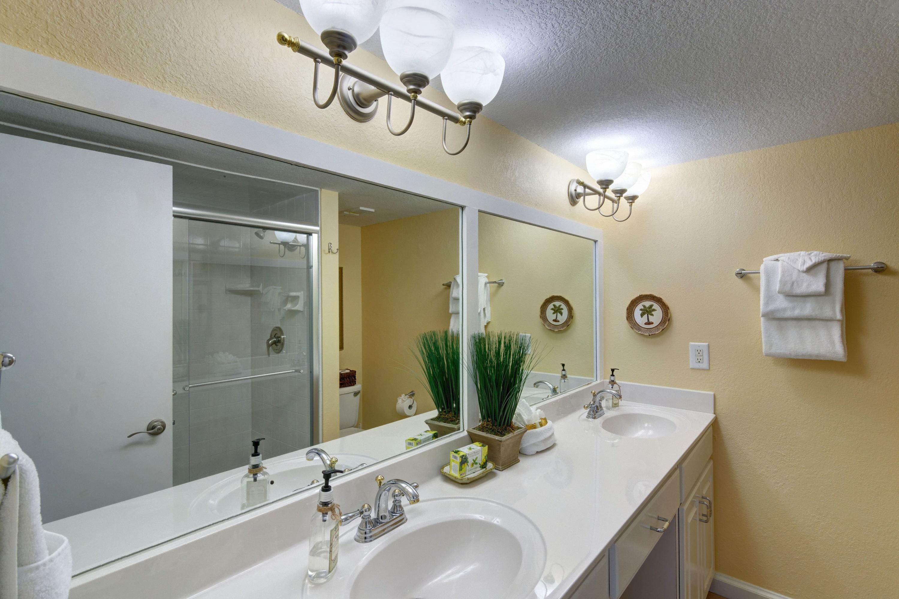 23223 Front Beach Road, Unit 701 Panama City Beach, FL 32413 - Photo 21 of 42 a bathroom with a sink and a mirror