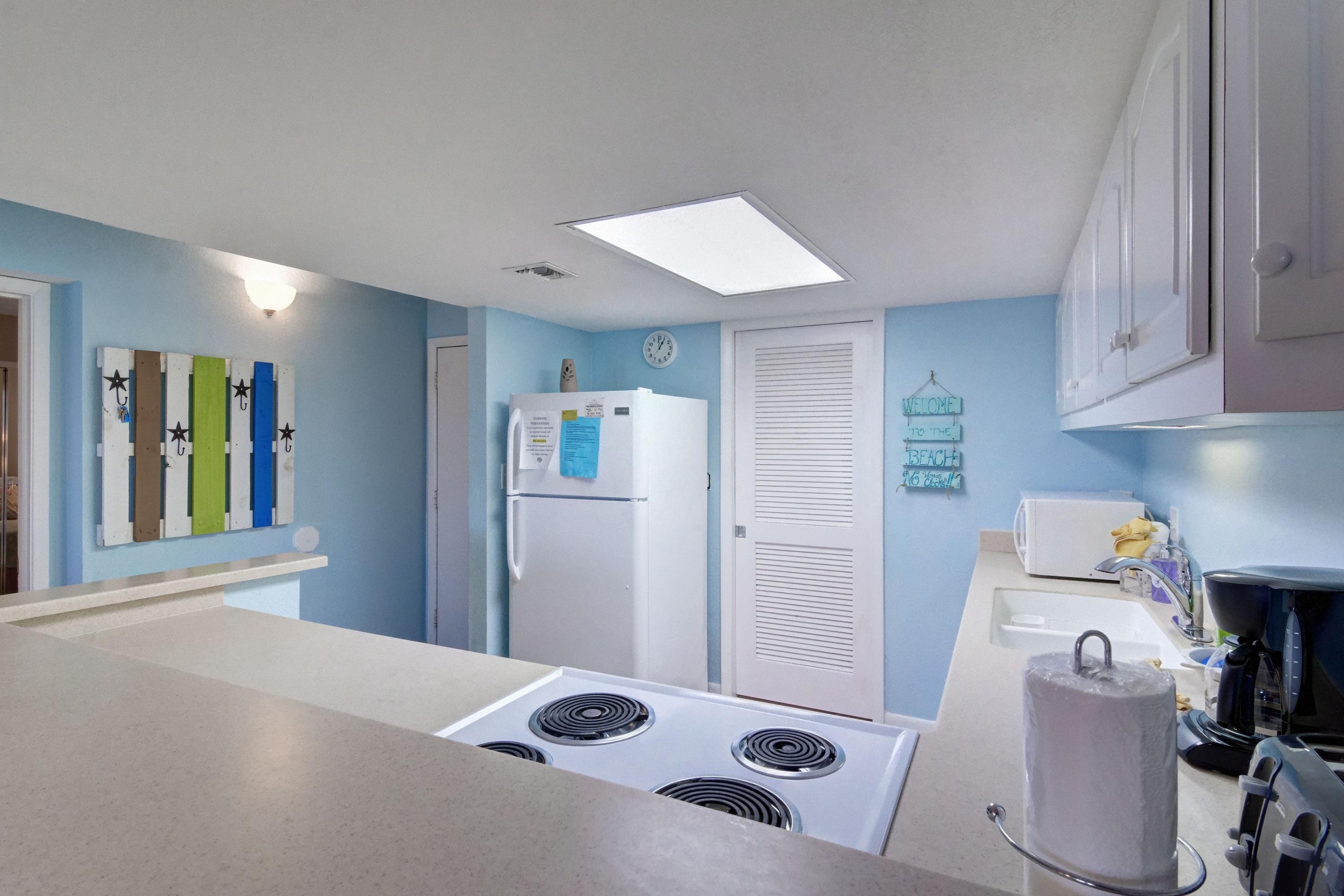 23223 Front Beach Road, Unit 701 Panama City Beach, FL 32413 - Photo 3 of 42 a bedroom with a bed and cabinets