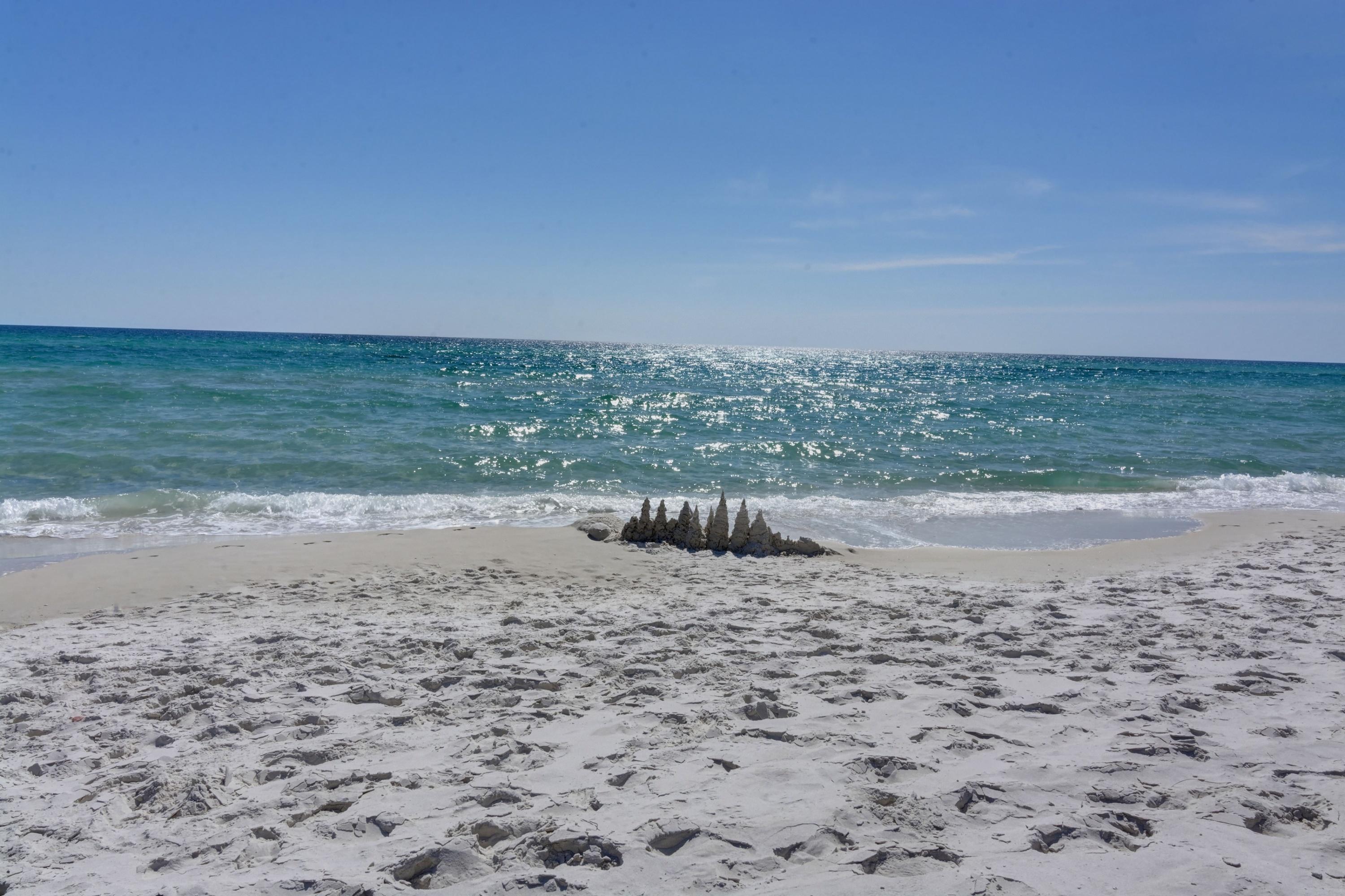 23223 Front Beach Road, Unit 701 Panama City Beach, FL 32413 - Photo 32 of 42 a view of a beach with an ocean beach