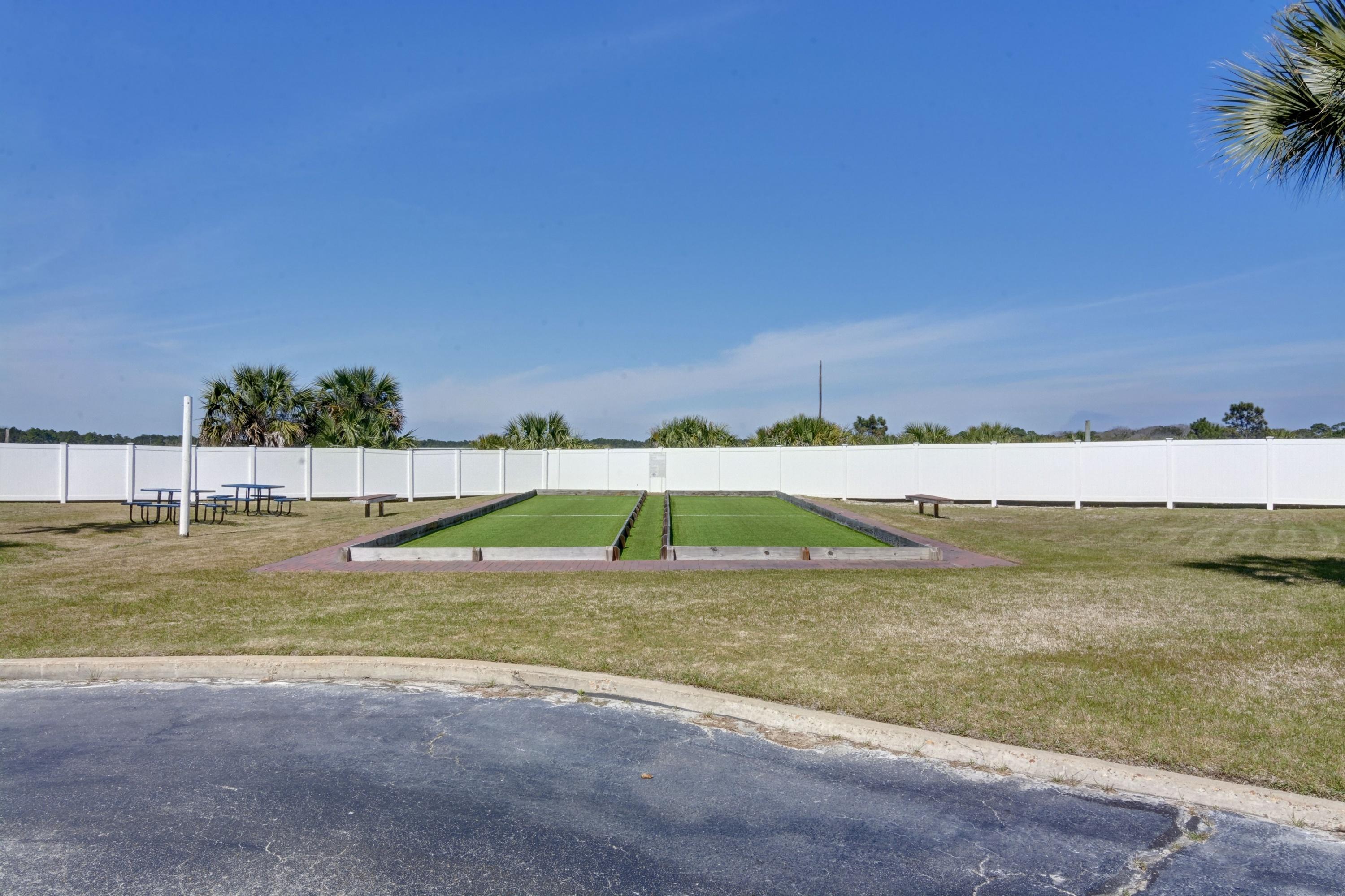 23223 Front Beach Road, Unit 701 Panama City Beach, FL 32413 - Photo 35 of 42 a view of a swimming pool and an ocean