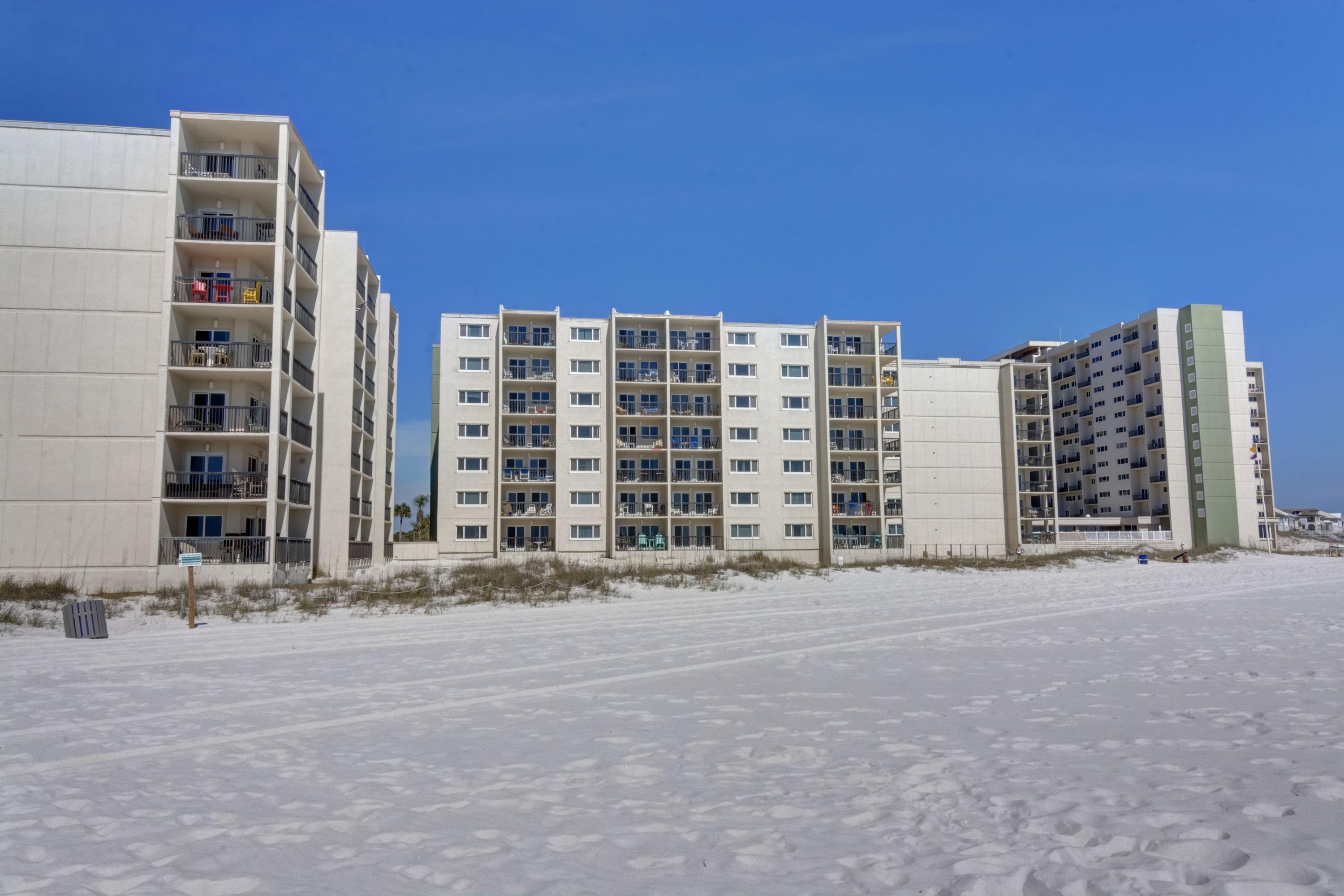 23223 Front Beach Road, Unit 701 Panama City Beach, FL 32413 - Photo 41 of 42 a front view of building with a yard