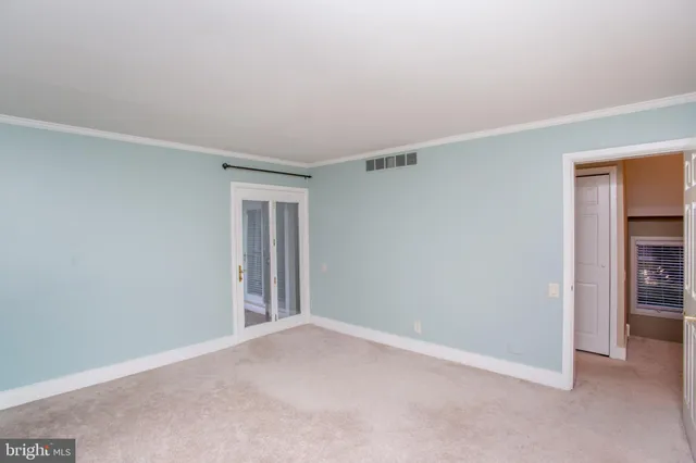 a bathroom with a sink toilet and mirror