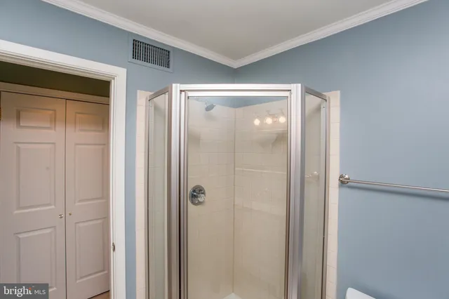 a view of a balcony with a yard