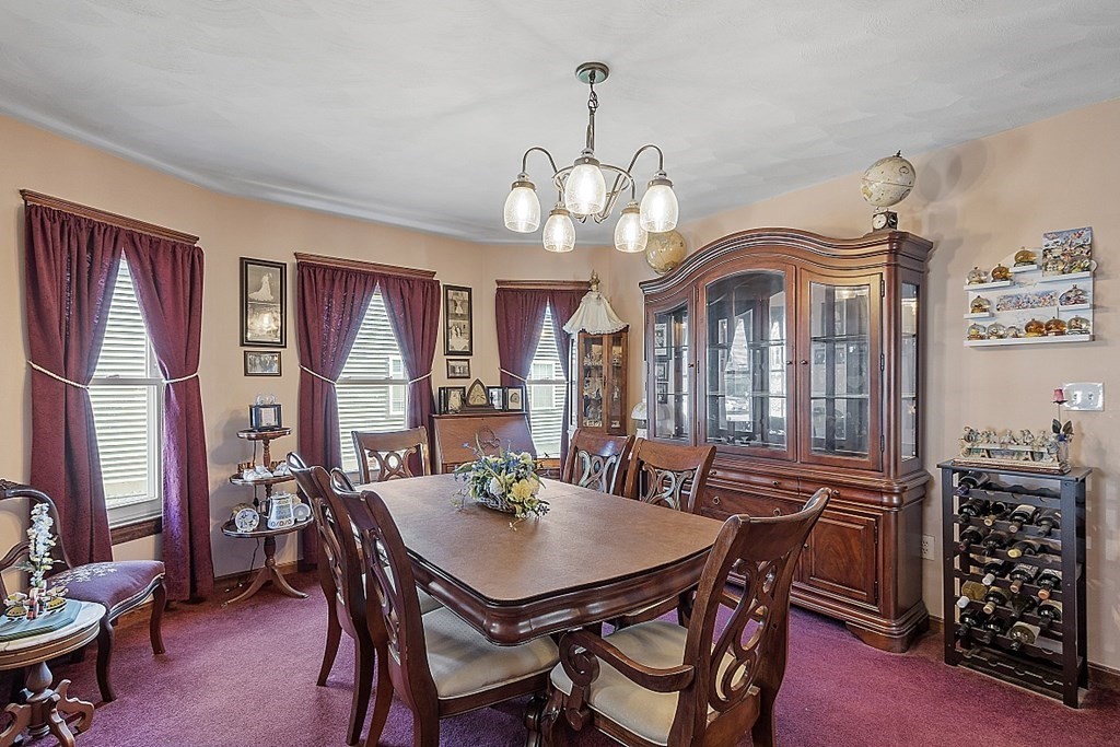 57 Vale Street Worcester, MA 01604 - Photo 12 of 39 a view of a dining room with furniture window and wooden floor