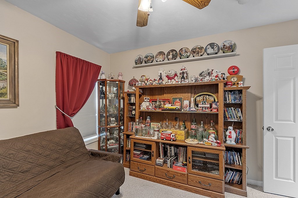 57 Vale Street Worcester, MA 01604 - Photo 22 of 39 a room with lot of cabinet and a window