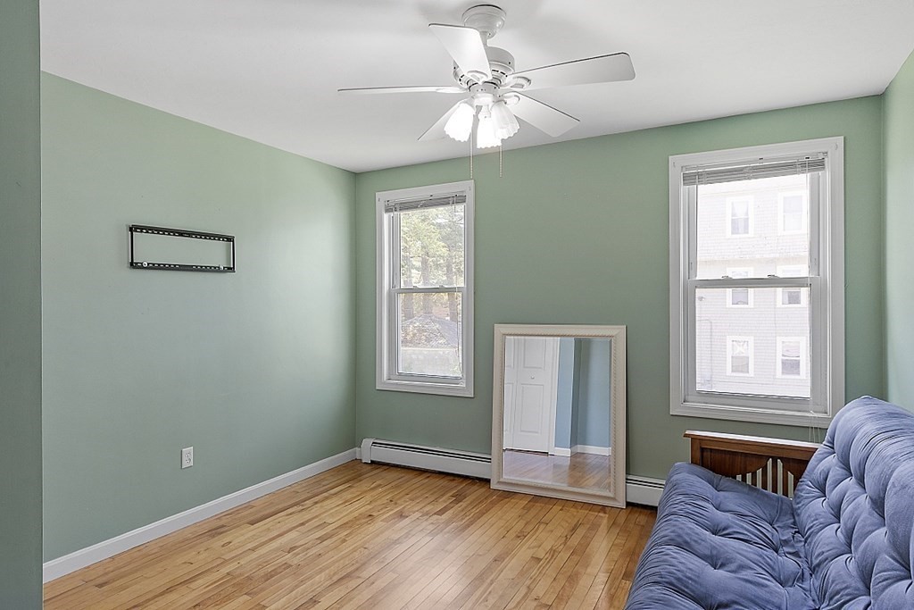 57 Vale Street Worcester, MA 01604 - Photo 35 of 39 a view of livingroom with hardwood floor and window