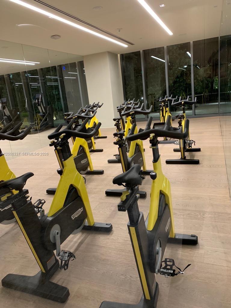 650 Northeast 32nd Street, Unit 705 Miami, FL 33137 - Photo 24 of 24 a view of a room with gym equipment