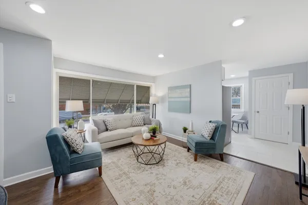a living room with furniture and a table