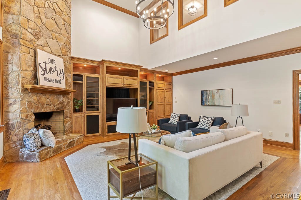 4110 Reeds Landing Circle Midlothian, VA 23113 - Photo 24 of 50 a living room with furniture and a fireplace
