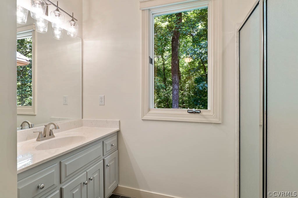 4110 Reeds Landing Circle Midlothian, VA 23113 - Photo 29 of 50 a bathroom with a sink and a mirror
