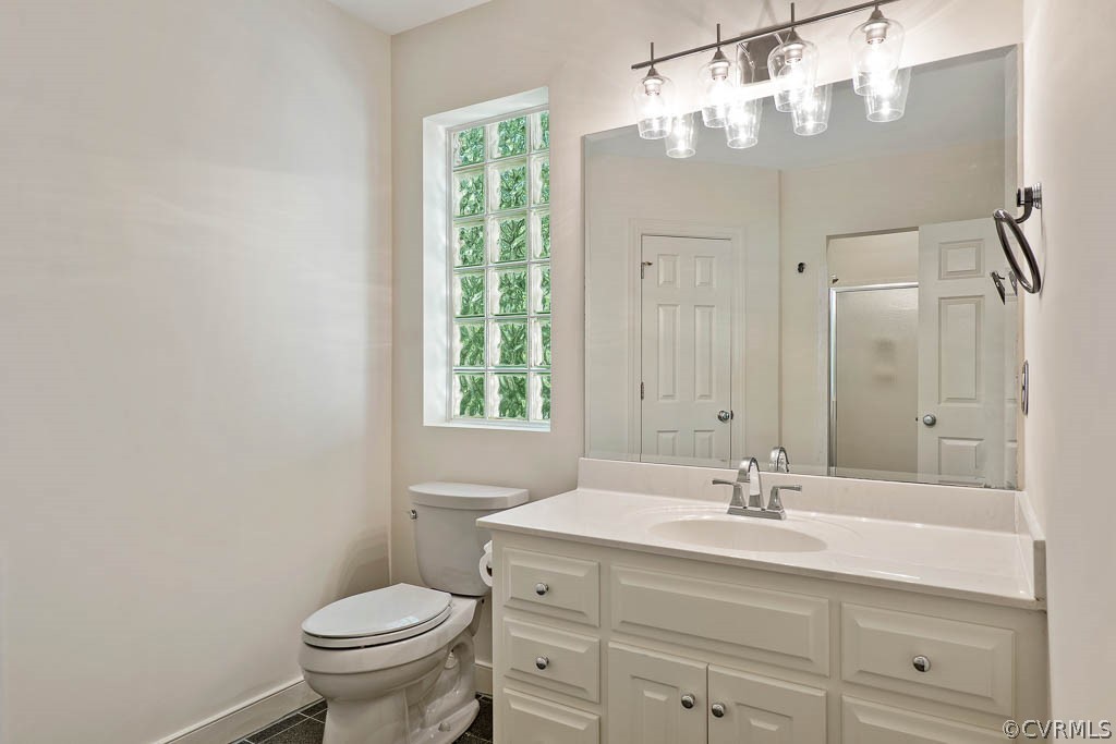4110 Reeds Landing Circle Midlothian, VA 23113 - Photo 31 of 50 a bathroom with a sink toilet and shower