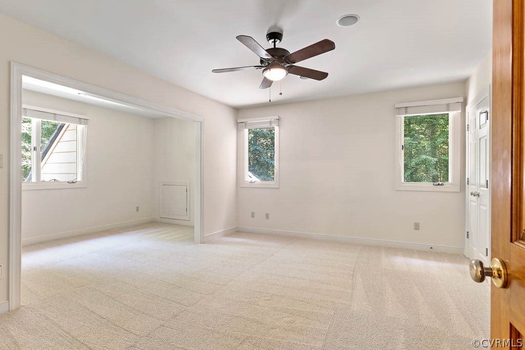 4110 Reeds Landing Circle Midlothian, VA 23113 - Photo 32 of 50 an empty room with a window and a fan