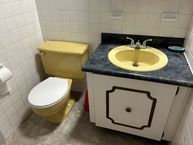 a bathroom with a tub and shower