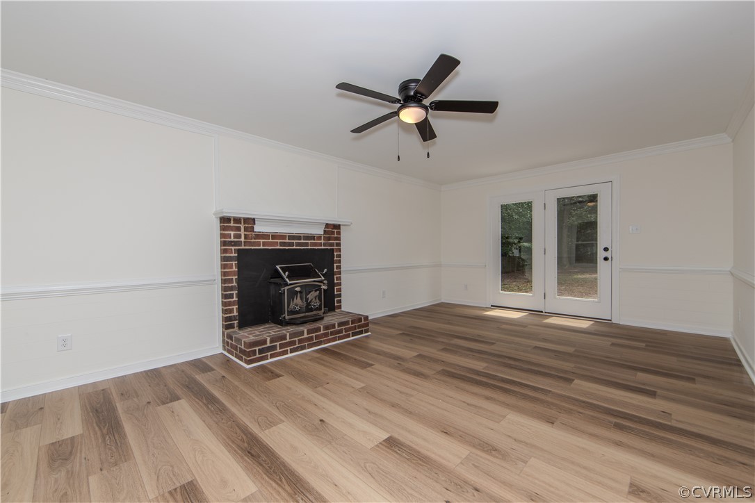 9309 Drawbridge Road Mechanicsville, VA 23116 - Photo 4 of 31 a view of an empty room with a fireplace and a window