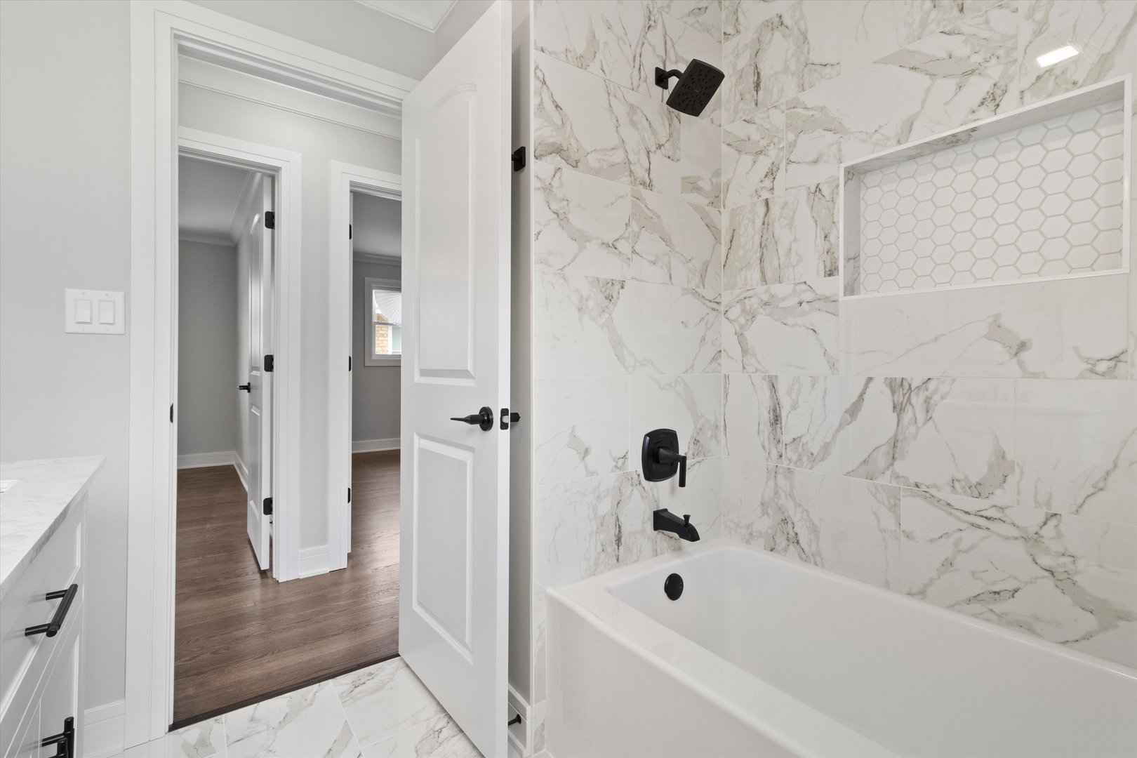 8804 South Fairfield Avenue Evergreen Park, IL 60805 - Photo 12 of 38 a bathroom with a bathtub and shower