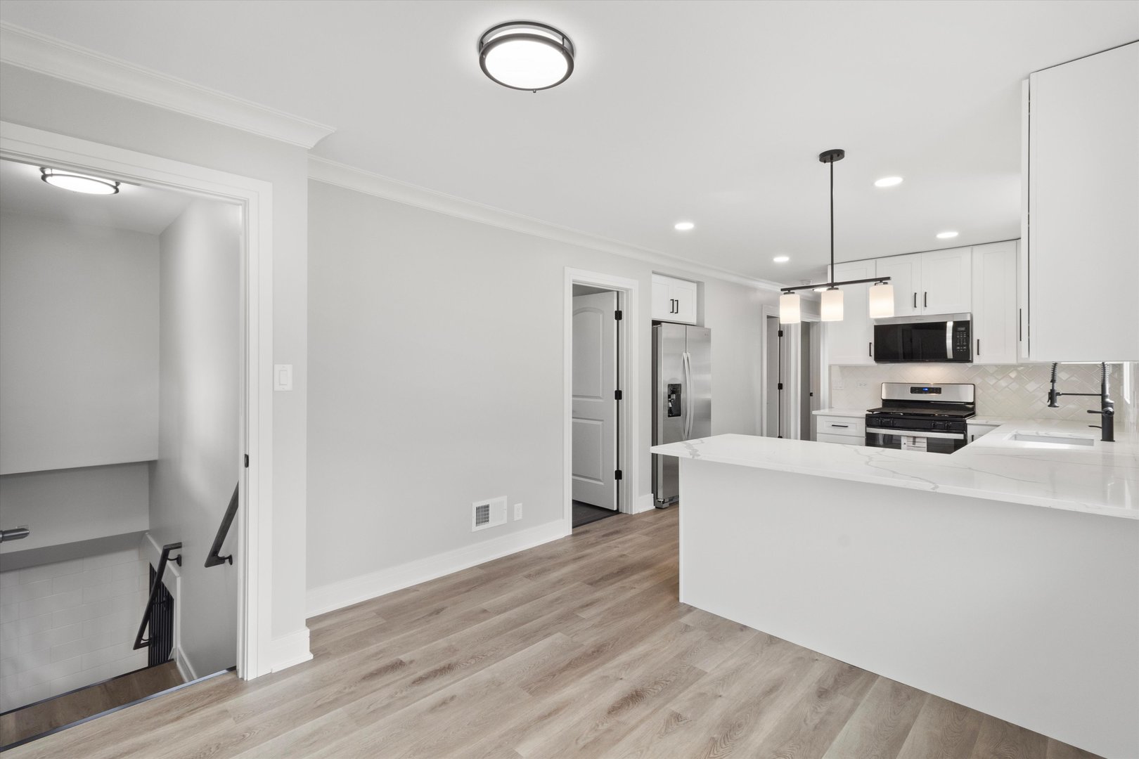 8804 South Fairfield Avenue Evergreen Park, IL 60805 - Photo 17 of 38 a view of kitchen with stainless steel appliances refrigerator stove microwave and refrigerator