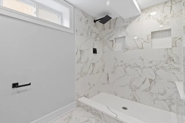 a bathroom with a bathtub