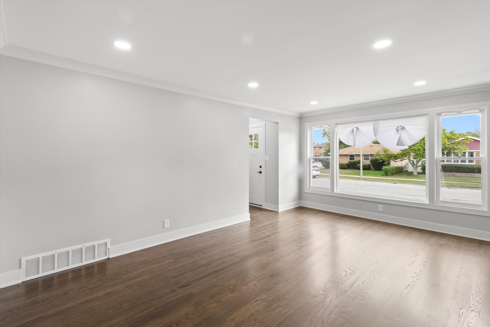 8804 South Fairfield Avenue Evergreen Park, IL 60805 - Photo 5 of 38 a view of room with window and wooden floor