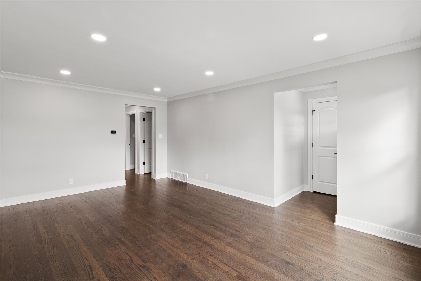 8804 South Fairfield Avenue Evergreen Park, IL 60805 - Photo 6 of 38 a view of an empty room with wooden floor